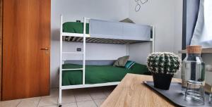 Postel nebo postele na pokoji v ubytování Guesthouse Tree Rooms Industrial