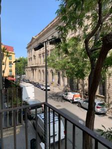 a view of a city street from a balcony at Hermoso piso en el centro de Barcelona in Barcelona