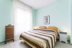 Postel nebo postele na pokoji v ubytování Hotel Molise 2