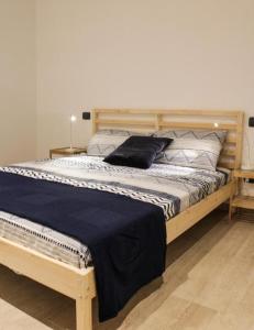 Кровать или кровати в номере La Dimora apartments
