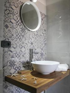 Ванная комната в La Dimora apartments