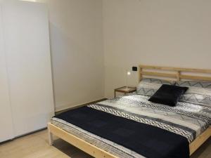 Кровать или кровати в номере La Dimora apartments