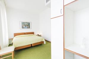 Postel nebo postele na pokoji v ubytování Hotel Molise 2