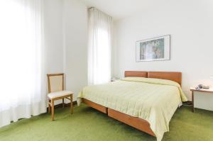 Postel nebo postele na pokoji v ubytování Hotel Molise 2