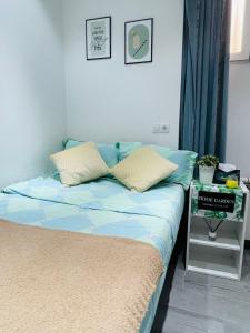 מיטה או מיטות בחדר ב-Fantastico Apartamento Estudio Centro