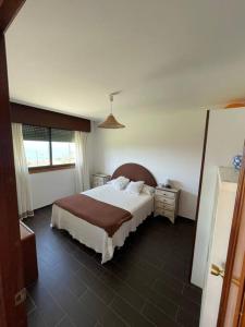Postel nebo postele na pokoji v ubytování Casa Chan do Eiro