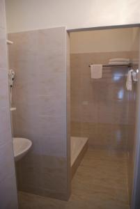 Koupelna v ubytování Hotel Astoria