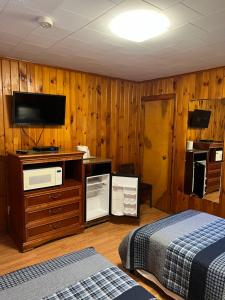 Kuchyň nebo kuchyňský kout v ubytování Doray Motel Lake George