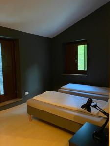 Postel nebo postele na pokoji v ubytování Casale Orgogliosa