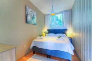 Ein Bett oder Betten in einem Zimmer der Unterkunft Casa Memory