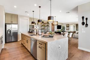 a kitchen with a large island in the middle at Scottsdale Scenery in Scottsdale