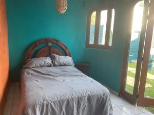 Кровать или кровати в номере Villa Oasis-Studio Room