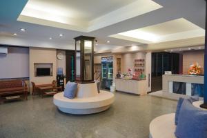 Posezení v ubytování Klaang Muang Hotel (โรงแรมกลางเมือง)