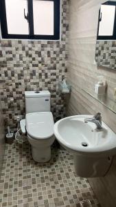 חדר רחצה ב-Sharkat Homestay