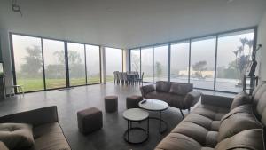 Posezení v ubytování Du Lịch Lâm Hà - Hồ Gia Trang Villas