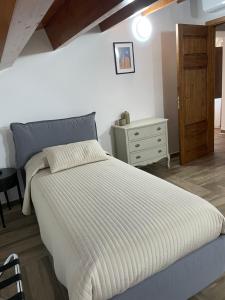 Postel nebo postele na pokoji v ubytování Palazzo Candida B&B