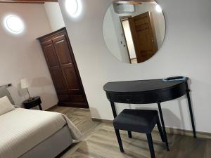 Postel nebo postele na pokoji v ubytování Palazzo Candida B&B