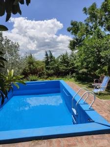 Bazén v ubytování La escondida nebo v jeho okolí