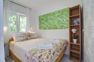 Ein Bett oder Betten in einem Zimmer der Unterkunft Casa Memory