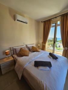Postel nebo postele na pokoji v ubytování Villa Felix + 13 fotografií