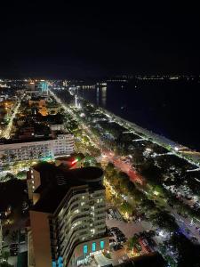 an aerial view of a city at night at Căn hộ nghỉ dưỡng bên bờ biển in Dong Quan