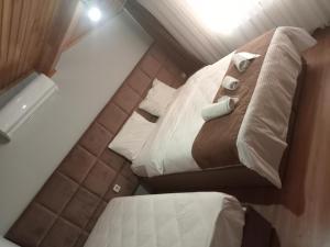 Postel nebo postele na pokoji v ubytování Terra Apart Taksim