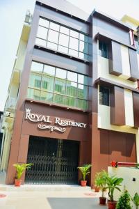 a building with the ryuatal residency logo on it at Hotel Royal Residency in Kolkata