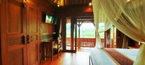 โทรทัศน์และ/หรือระบบความบันเทิงของ Nandimas Ubud Villa #2