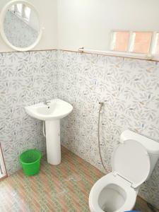 a bathroom with a toilet and a sink at LUCKY Bungalows Koh Mook in Ko Mook +80 photos