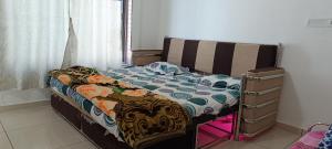 Postel nebo postele na pokoji v ubytování PATEL HOME STAY