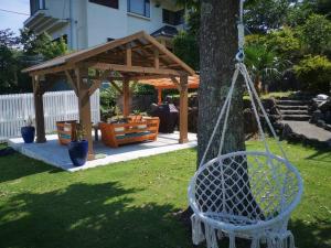 O grădină în afara 貸別荘Casa de Campo 2SLDK别墅 駐車場 芝生東屋付き BBQ 大室山と海遠望伊豆高原5分
