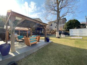 O grădină în afara 貸別荘Casa de Campo 2SLDK别墅 駐車場 芝生東屋付き BBQ 大室山と海遠望伊豆高原5分