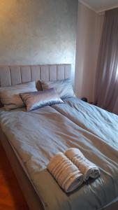 Postel nebo postele na pokoji v ubytování Apartment Maras