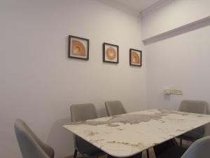 a conference room with a table and chairs at OSI Apartments Perry Cross Bandra West in Mumbai
