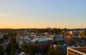 an aerial view of a city at sunset at The Ven at Embassy Row, Washington, D.C., a Tribute Portfolio Hotel in Washington, D.C.