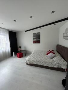 Katil atau katil-katil dalam bilik di Balvu iela 3 Sunshine Home