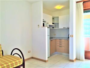 Kuchyň nebo kuchyňský kout v ubytování Bibione Residence Apartments