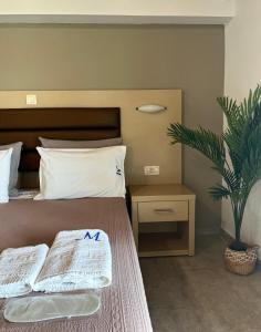 Posteľ alebo postele v izbe v ubytovaní Maria Resort Parga