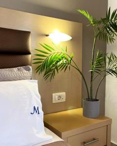 Posteľ alebo postele v izbe v ubytovaní Maria Resort Parga