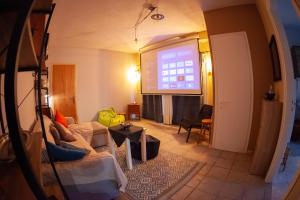 Posezení v ubytování Jimmy's Cozy Apartment