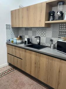 A kitchen or kitchenette at Charmie flat