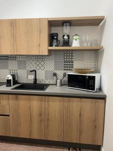 A kitchen or kitchenette at Charmie flat