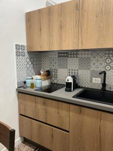 A kitchen or kitchenette at Charmie flat