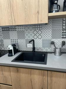A kitchen or kitchenette at Charmie flat