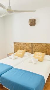 מיטה או מיטות בחדר ב-Apartments Es Clot des Forn