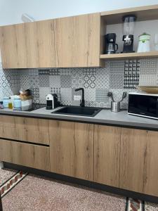 A kitchen or kitchenette at Charmie flat