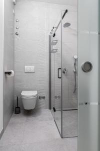 a bathroom with a shower and a toilet at Luxury Apartments Klara in Split