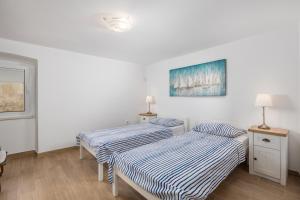 Кровать или кровати в номере Mediterranean house Markoc new renovated!