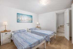 Кровать или кровати в номере Mediterranean house Markoc new renovated!