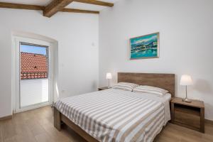 Кровать или кровати в номере Mediterranean house Markoc new renovated!